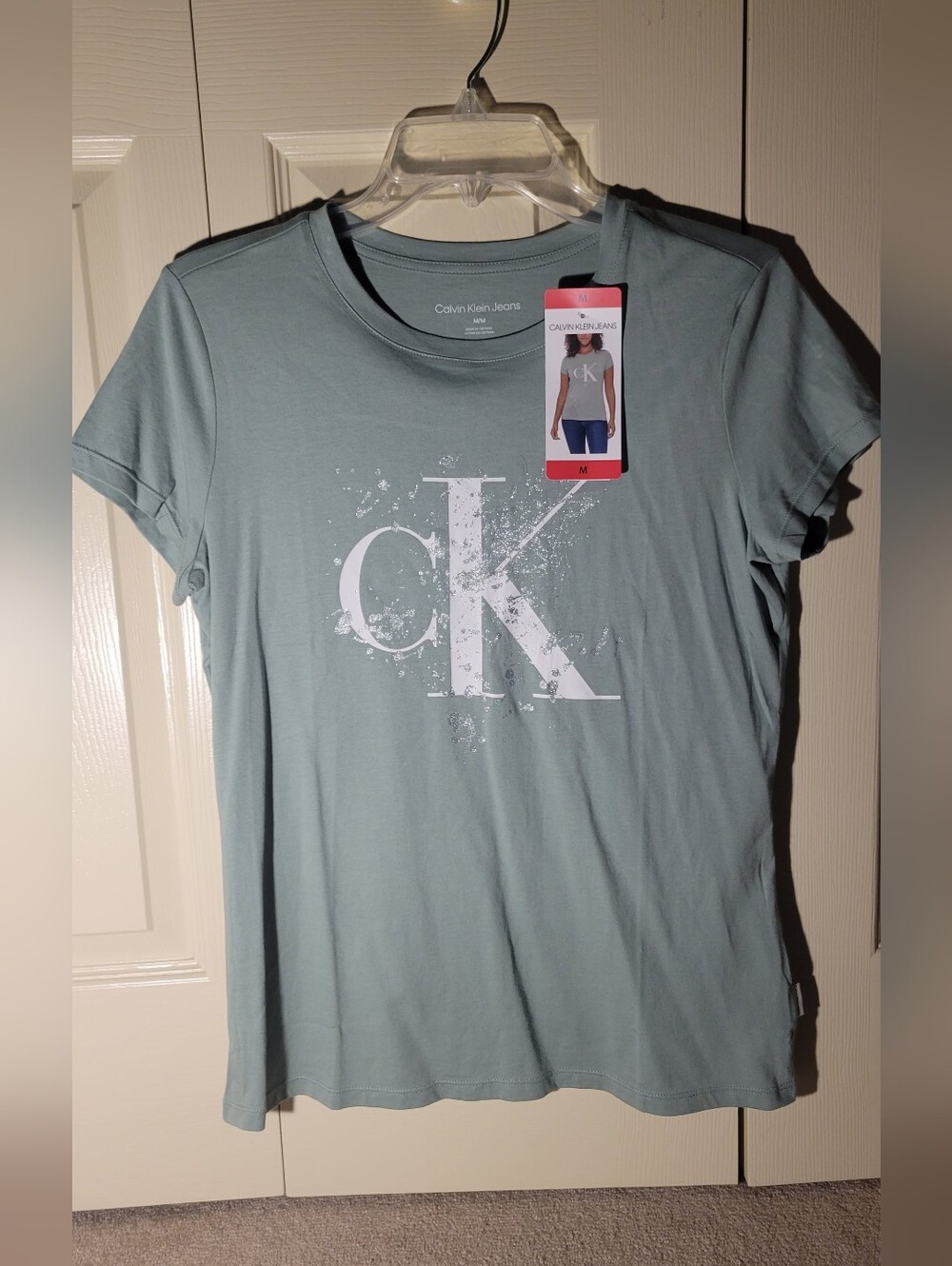 Calvin Klein Logo Tee in Sage Green Silver Sparkle Splash Design